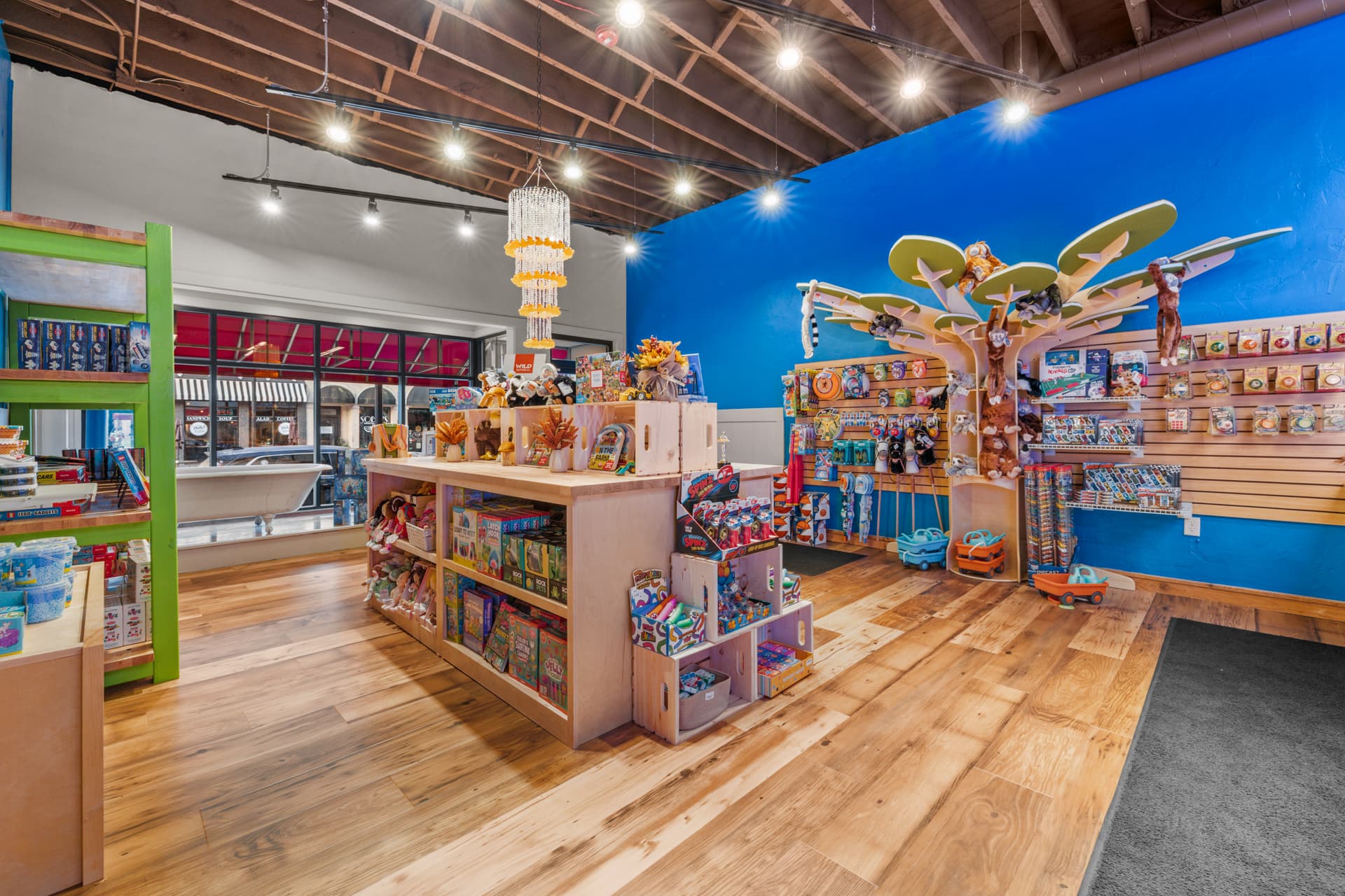 Colorful toy displays and the stuffed-animal tree inside Six Little Ducks