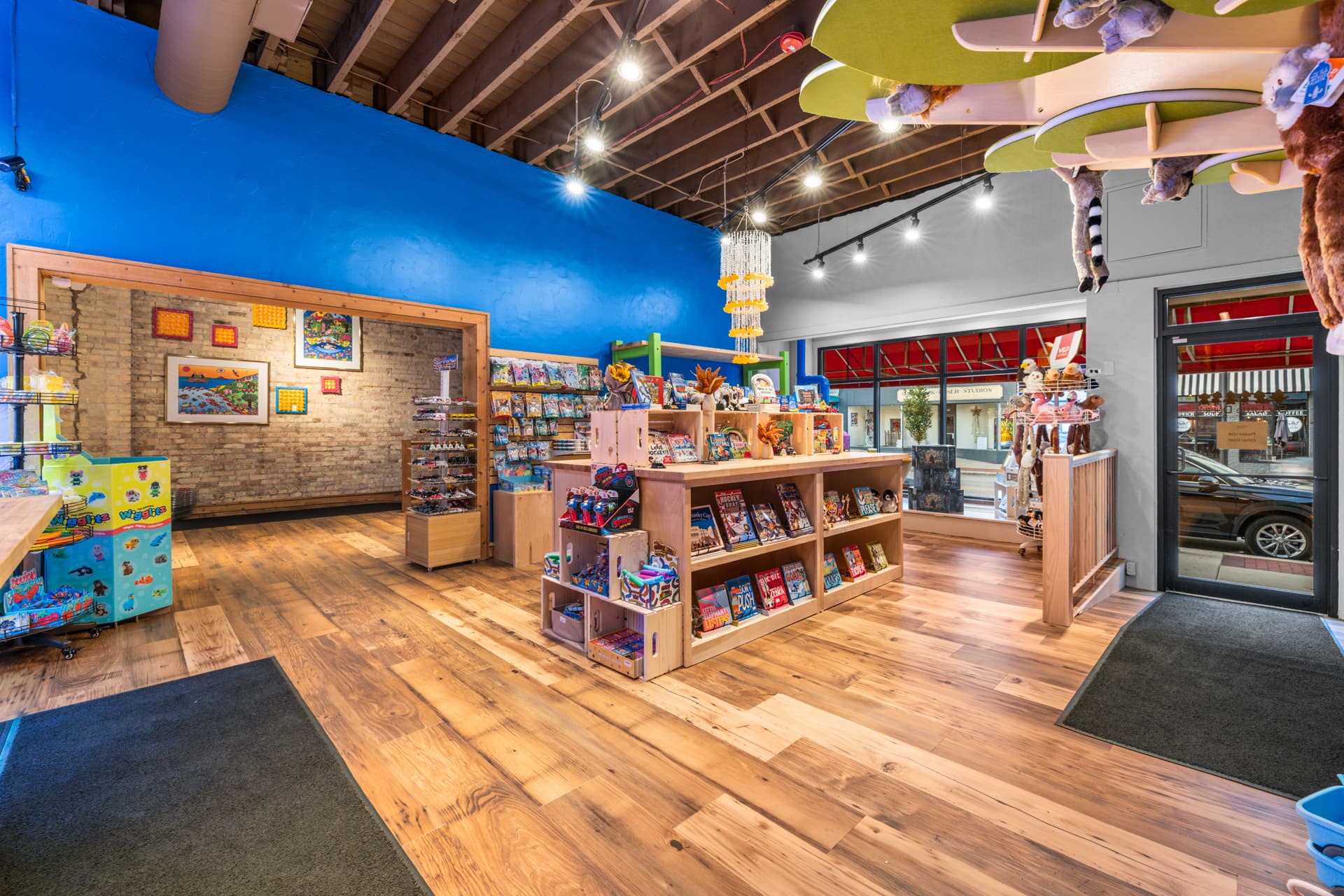 Wide view of the colorful Six Little Ducks toy store in downtown Oconomowoc